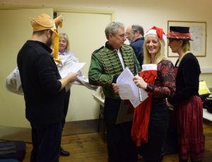 The players (and a couple of characters from the audience) prepare for the Mummer's Play.