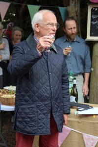 Peter raises a glass